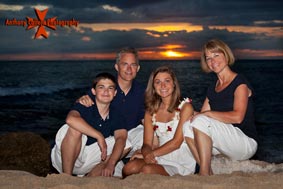 Sunset family portrait photography session at secret beach in Koolina