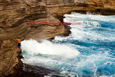 Cliff Jumper observes the Spitting Cave at Portlock Oahu Hawaii