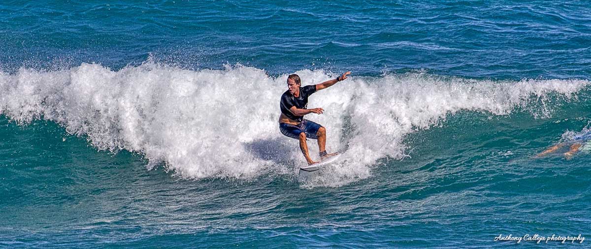 Surf Photography - Surfer catching a wave at Diamondhead Beach, Honolulu Oahu Hawaii