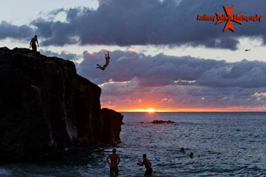 Cliff Jumper at Sunset Wamea Bay North Shore Oahu Hawaii