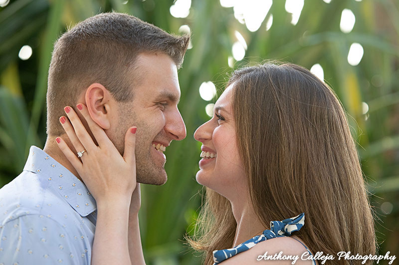 Close up Portrait of Jesse & Ariella smiling at each other