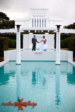 Hawaii Temple Wedding Photography - Bride and Groom holding hand at Laie Temple